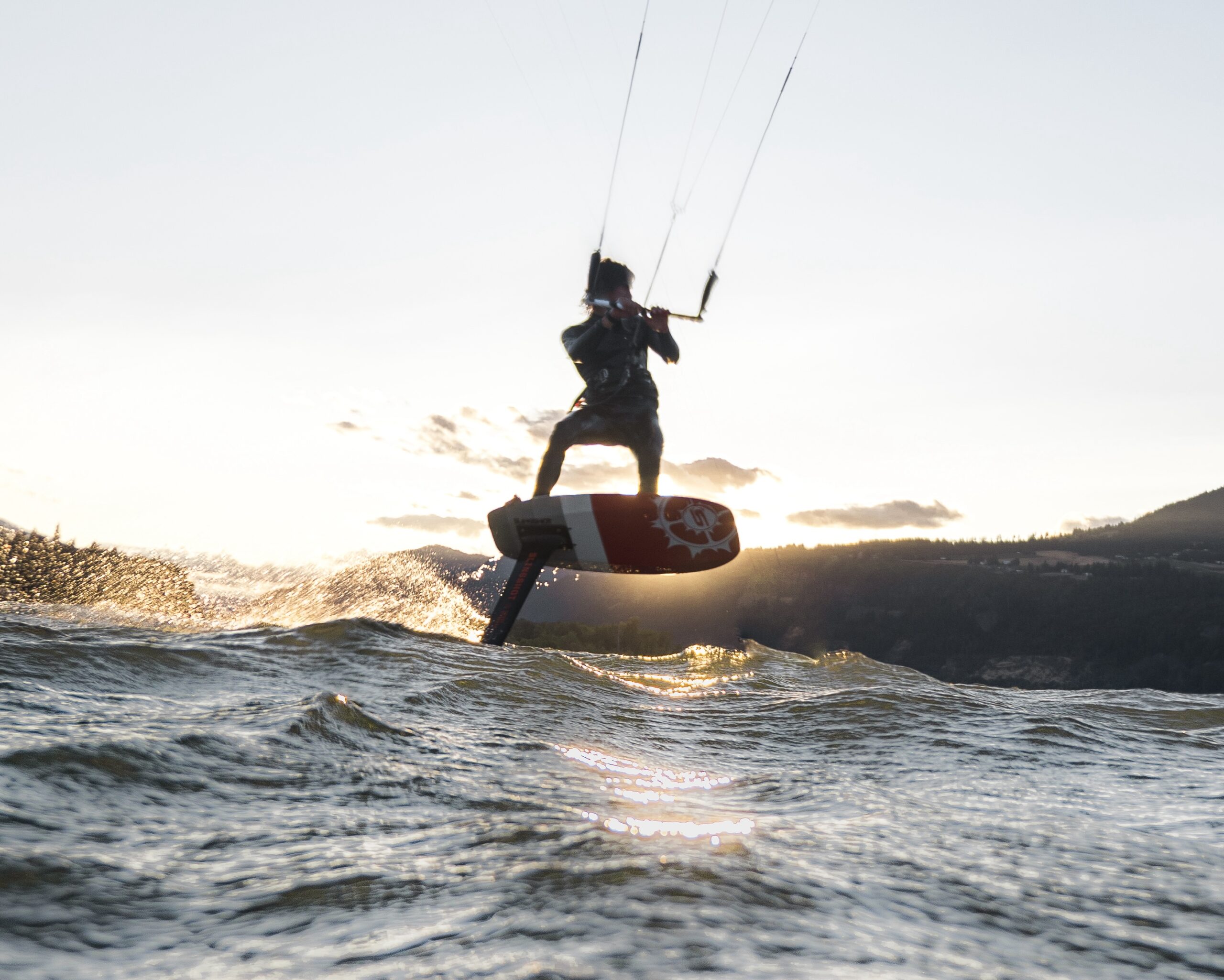 Kitesurfer riding strong Columbia River Gorge winds near Hood River