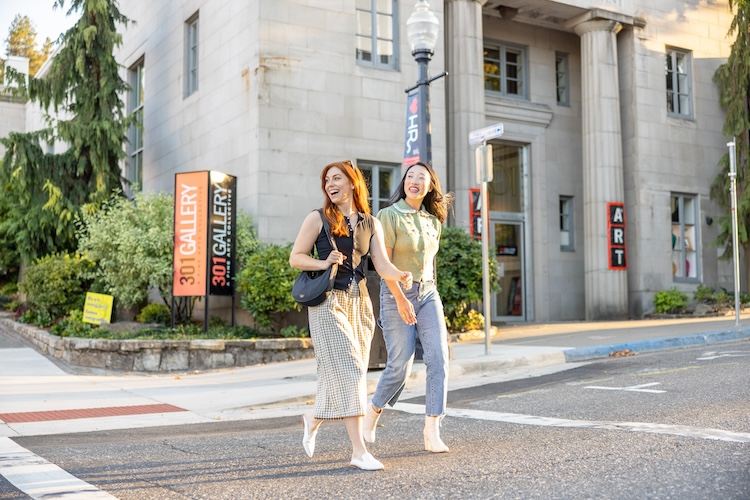 Two women walking downtown Hood River